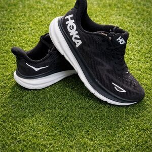 Hoka Black and White Athletic Sneakers